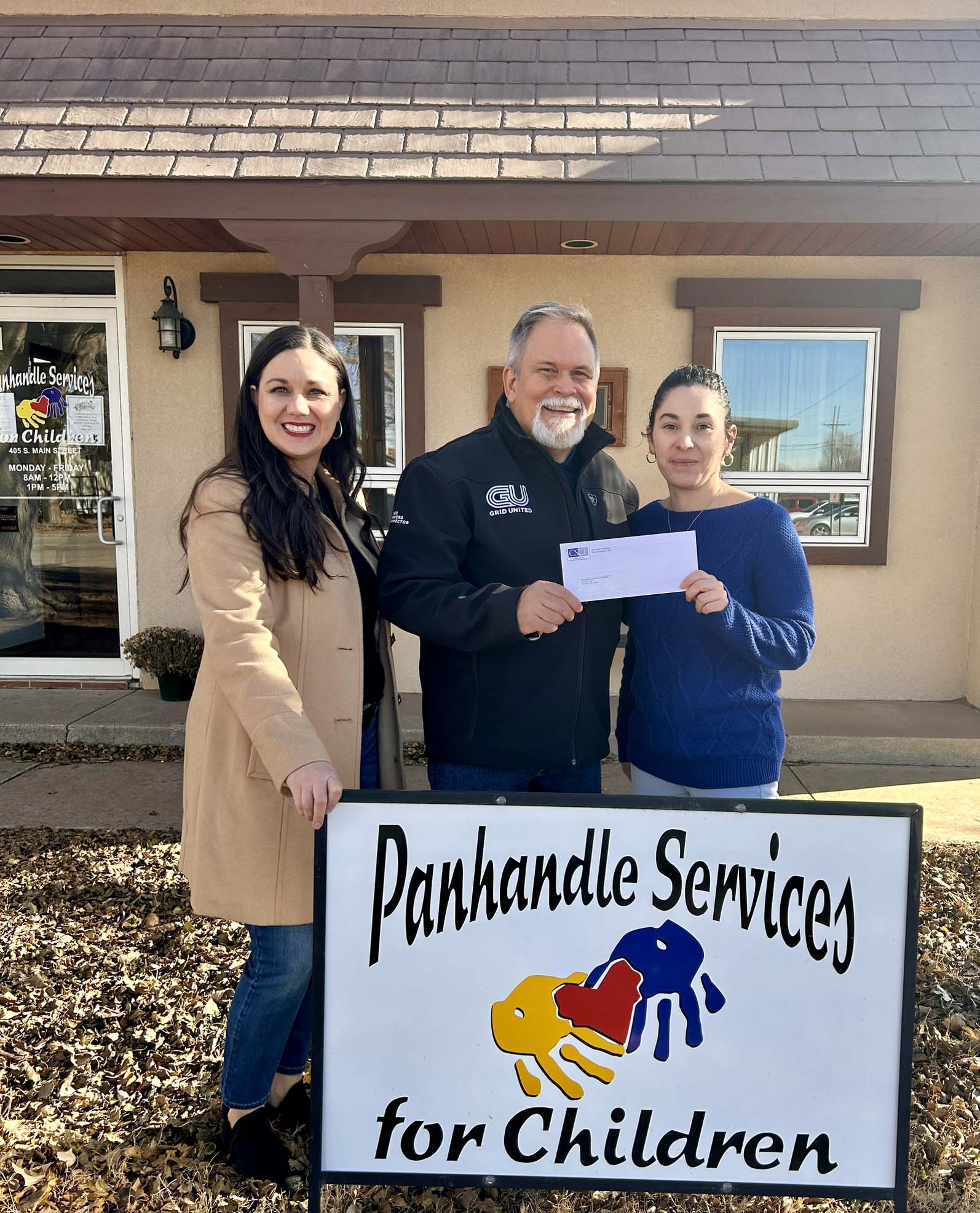 Panhandle Services for Children - pictured left to right - Carrie Sanders, CSCF Executive Director; Alan Manning, Three Corners Connector Project Communications Specialist; presents check to Jessica Martinez, Panhandle Services for Children Executive Director